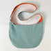 light teal and orange linen crossbody market tote made in Seattle by Satsuma Designs