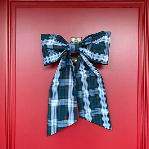 Plaid bow decoration on a red door